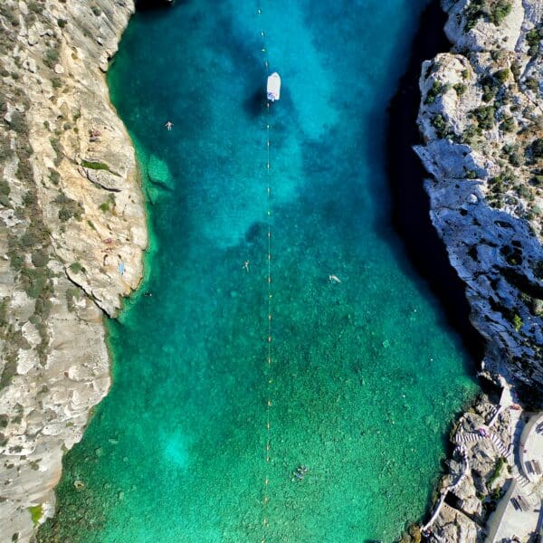 Stunning aerial view of the Blue Hole and Inland Sea in Gozo, Malta. This iconic scuba diving destination is renowned for its crystal-clear waters, unique geological formations, and vibrant marine life. Perfect for both beginner and experienced divers, Gozo offers an unforgettable underwater adventure. Plan your trip now and dive into the beauty of the Mediterranean!
