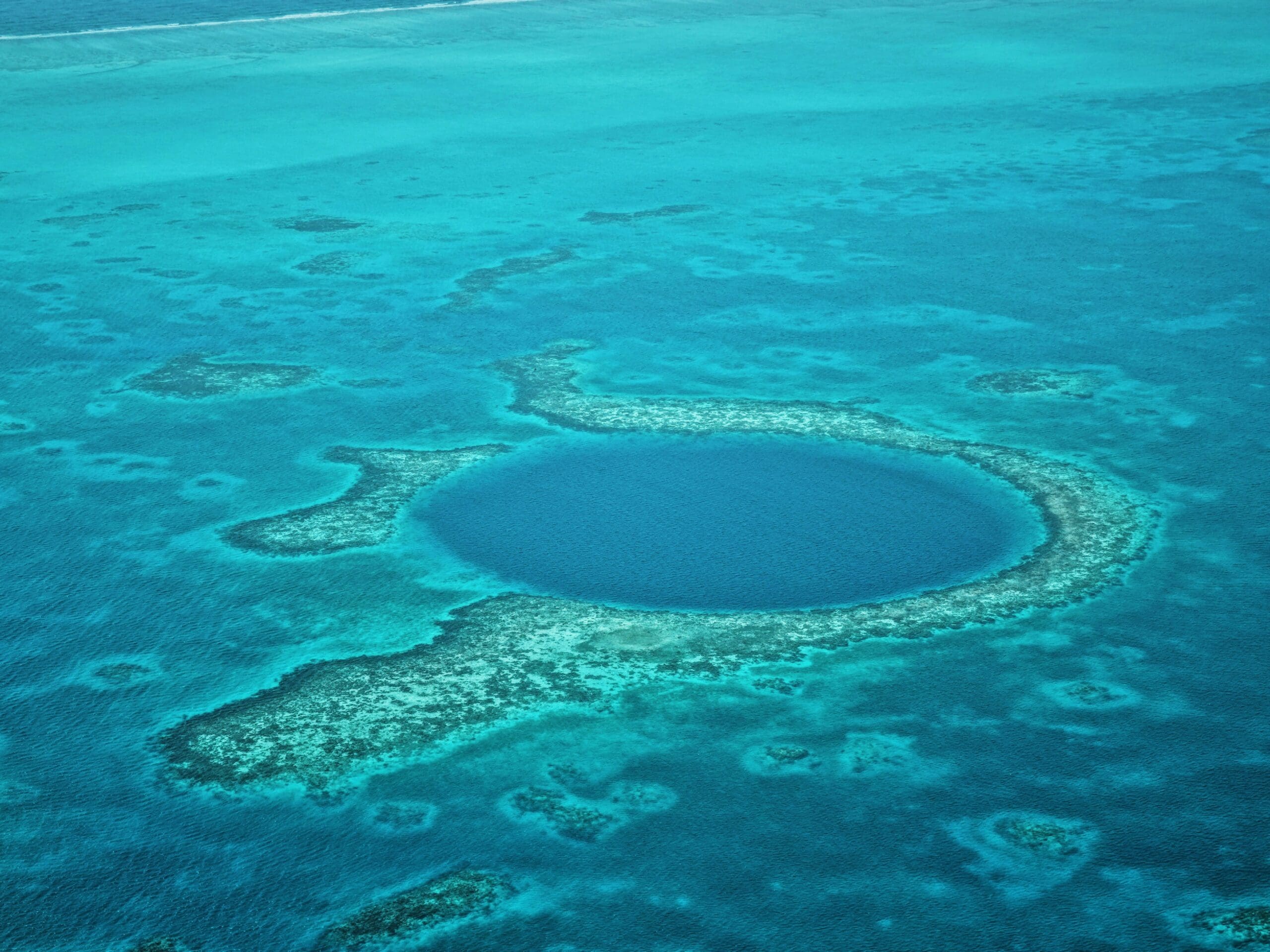 Aerial view of Great Blue Hole, Belize coral reefs
