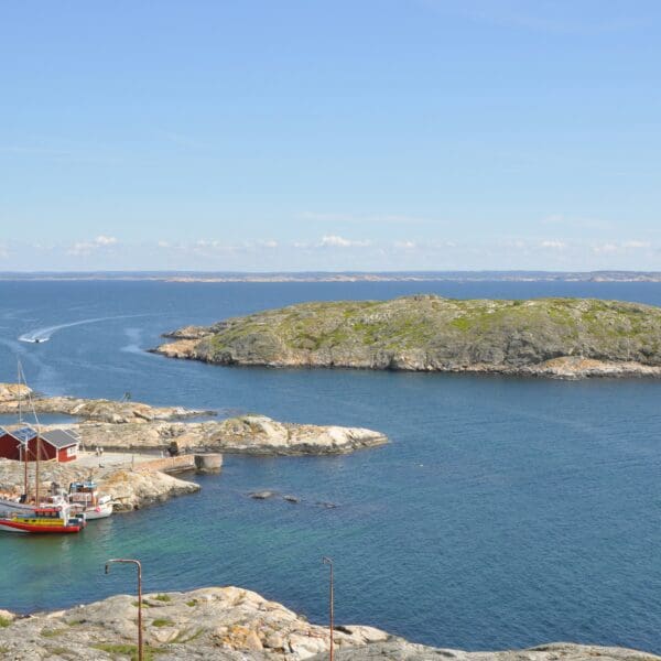 Scenic coastal view with boats and rocky islands