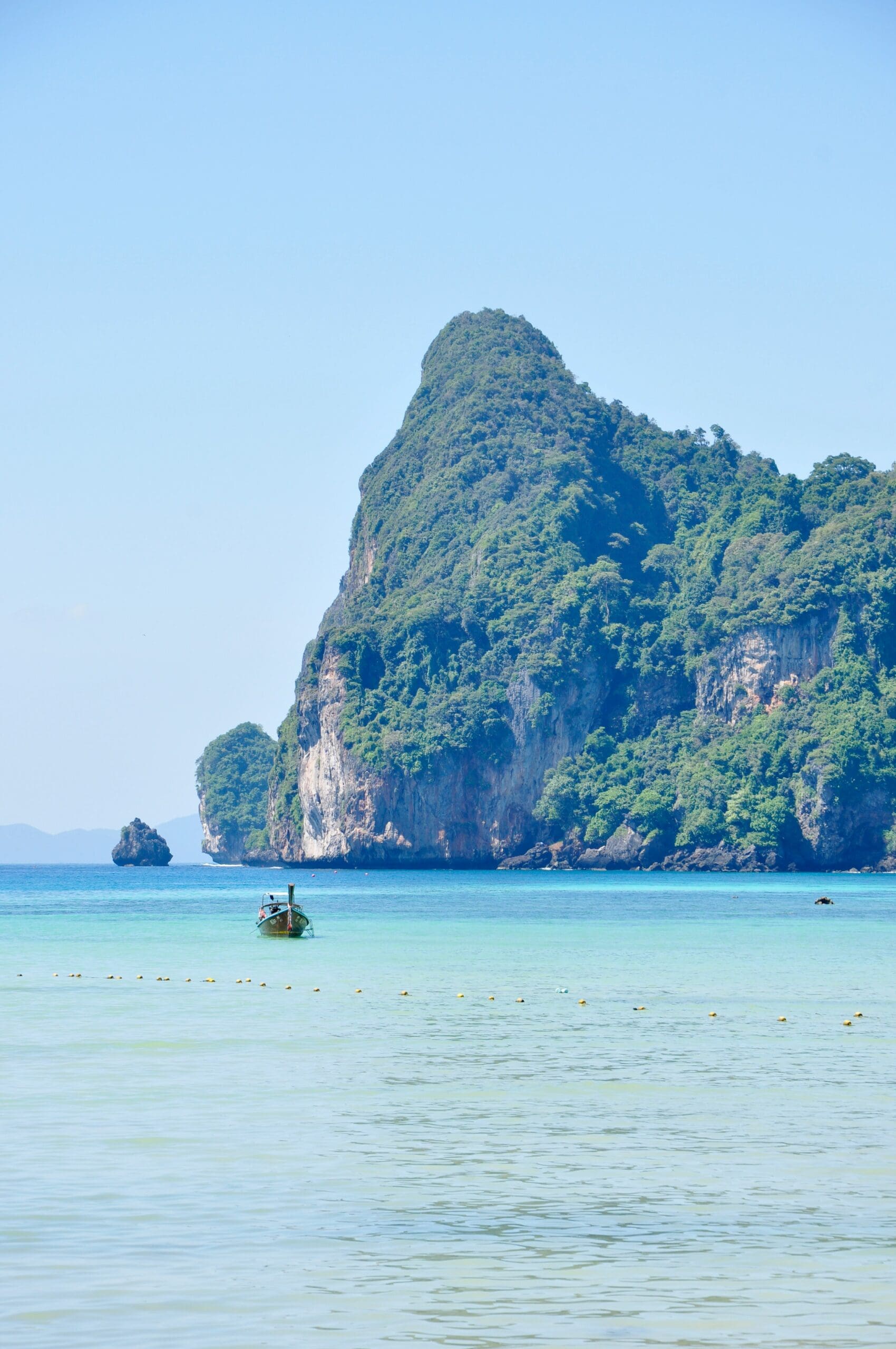 Scenic ocean view with island and boat