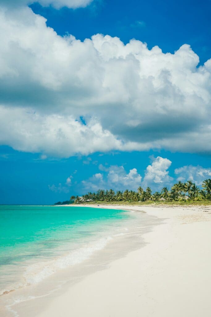 Tropical beach with clear blue water and white sand