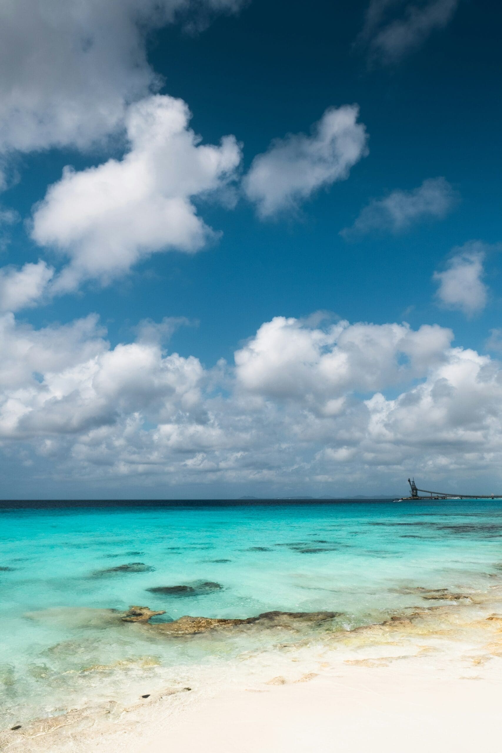 Crystal clear turquoise sea with white sandy beach