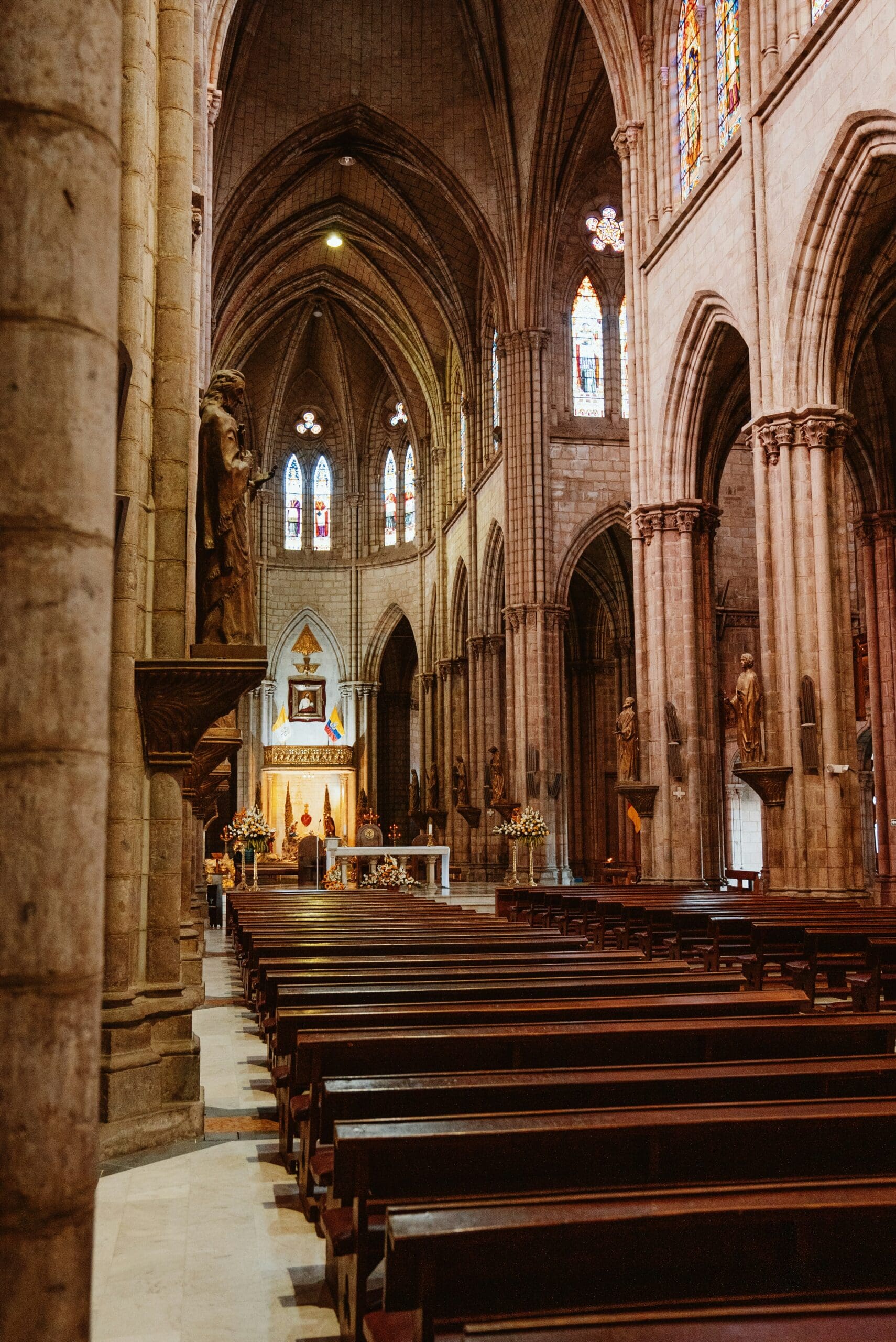 Gothic church interior with stained glass windows