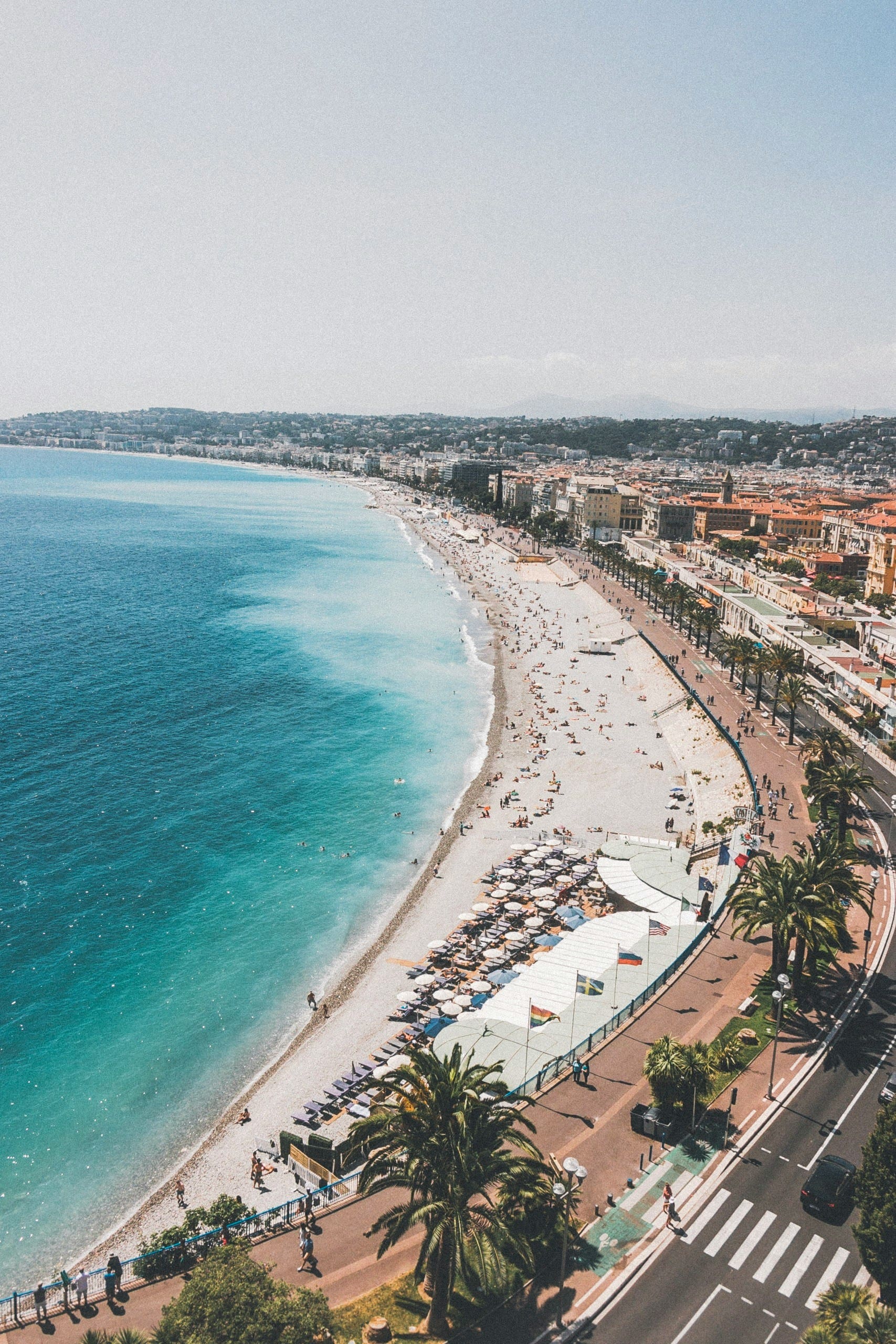 Aerial view of crowded beach and turquoise sea