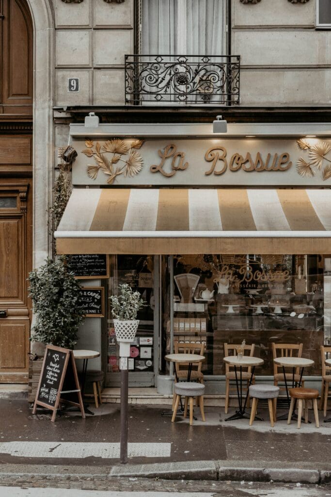 Charming Parisian cafe front, La Bossue, with outdoor seating