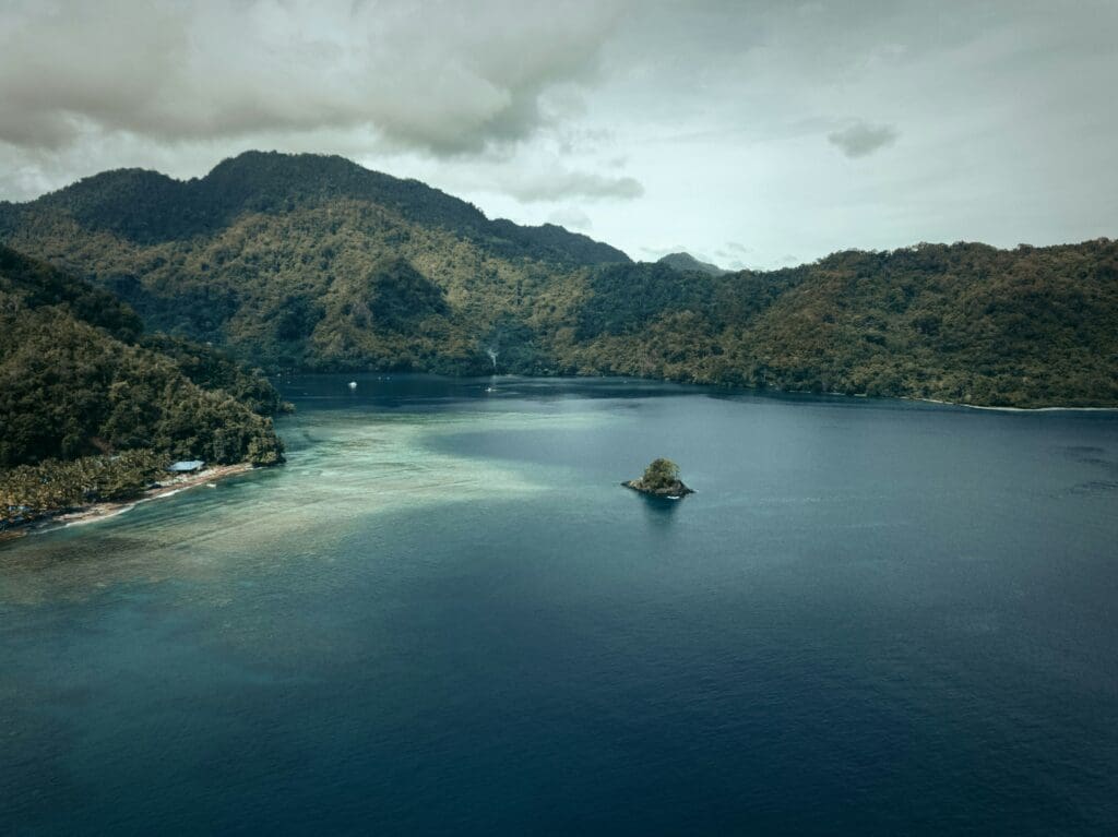 Aerial view of serene island surrounded by turquoise waters
